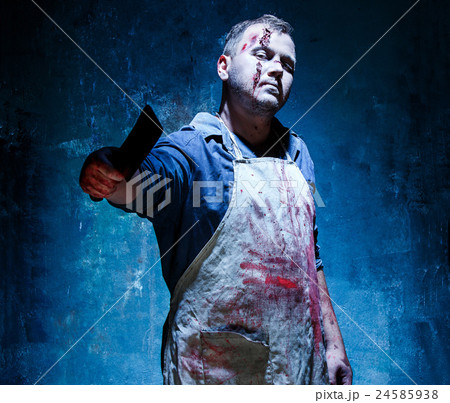 Bloody Halloween theme: crazy killer as butcher Bloody Halloween theme: crazy killer as butcher 24585938