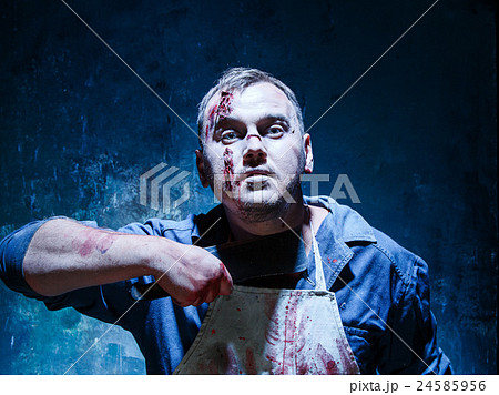 Bloody Halloween theme: crazy killer as butcher 24585956