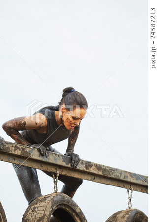 Extrim survival race concept.  Action woman 24587213