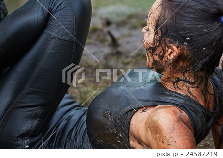 Extrim survival race concept.  Action woman 24587219