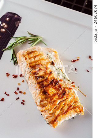 fish steak with sauce 24602074