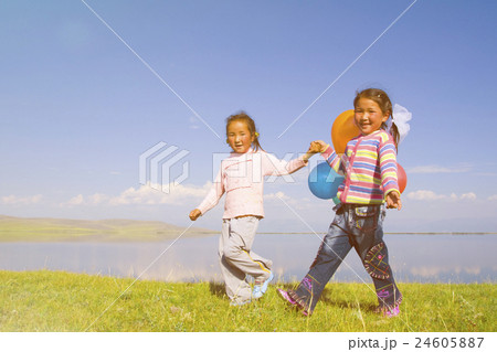 Asian Girls Playing Lake Concept 24605887