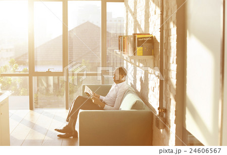 Businessman Reading Magazine Relaxation Concept Businessman Reading Magazine Relaxation Concept 24606567