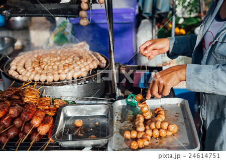 Thai woman cooks meatballs 24614751