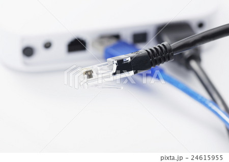 Close up of LAN cable isolated on white background Close up of LAN cable isolated on white background 24615955