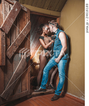 man and woman hug in the door 24616189