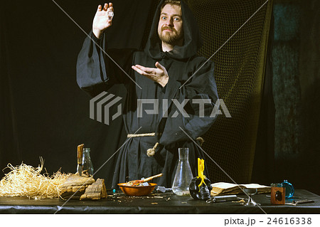medieval scientist working in his laboratory medieval scientist working in his laboratory 24616338