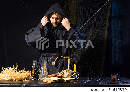 crazy  scientist working in his laboratory 24616339