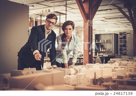 Team of engineers working in a architect studio. 24617139