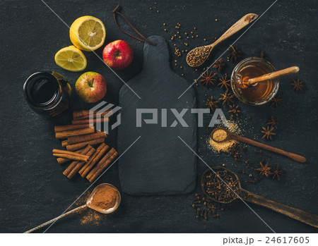 Ingredients for making mulled wine over blue 24617605