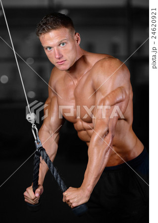 athletic man fitness model showing six pack abs 24620921