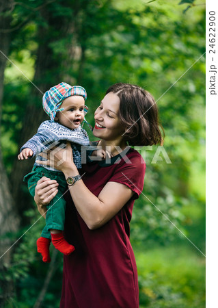 young family with a child on the nature 24622900