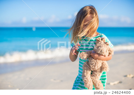 Adorable little girl with her favorite toy on Adorable little girl with her favorite toy on 24624400