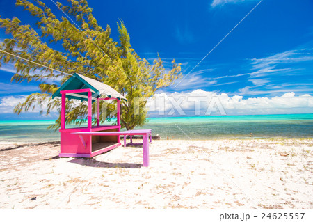 Traditional bright Caribbean houses on shore 24625557