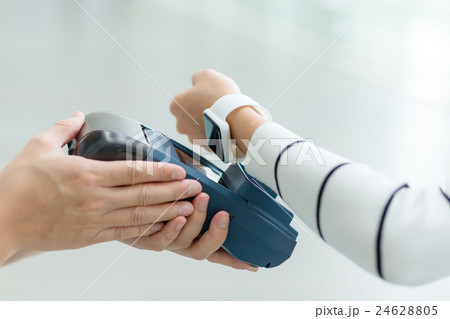 Woman pay by smart watch 24628805