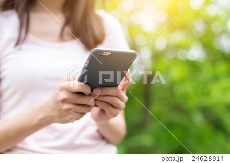 Woman use of mobile phone 24628914