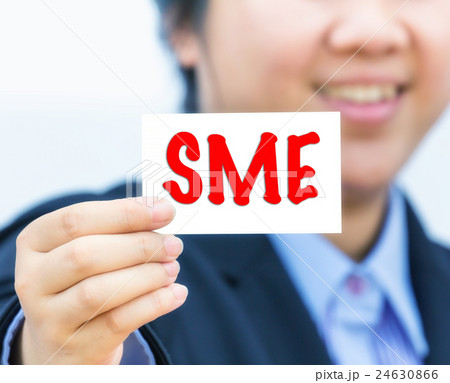 Businesswoman holding card with SME message. 24630866