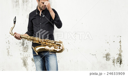 Jazzman Musical Artist Playing Saxophone Concept 24633909