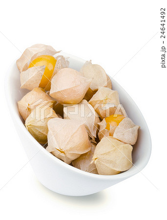 Physalis berries in white porcelain bowl 24641492
