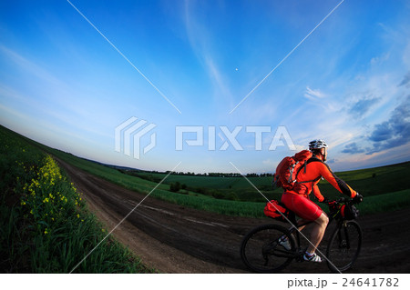 Mountain bikeer rides on the trail against 24641782