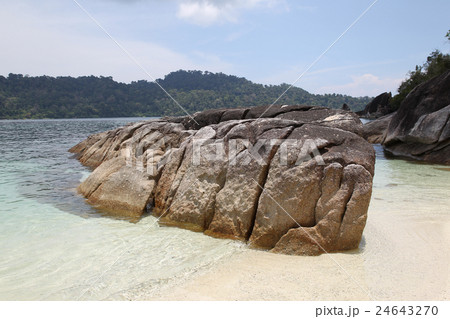 Large boulders on the beach 24643270