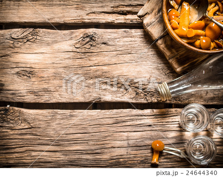 Russian style. Vodka with pickled mushrooms. Russian style. Vodka with pickled mushrooms. 24644340
