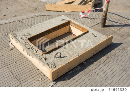 Filled with concrete cesspit prepared for installation 24645320