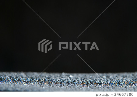 Dark background and water drops lying on Dark background and water drops lying on 24667580