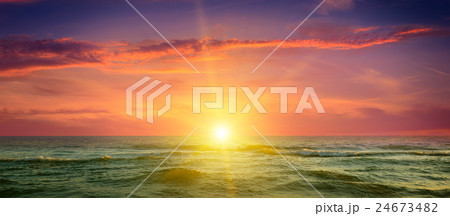 ocean, cloudy sky and a fantastic sunset 24673482