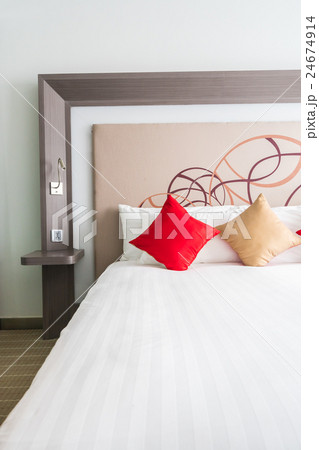 Pillow on bed 24674914