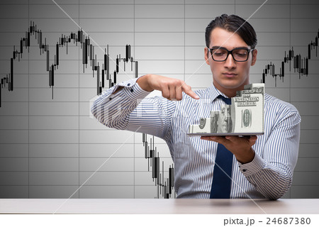 Young businessman in online trading concept 24687380