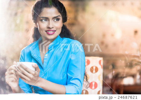 Indian woman with coffee mug 24687621