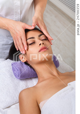 Woman beautician doctor make neck massage in spa Woman beautician doctor make neck massage in spa 24700359