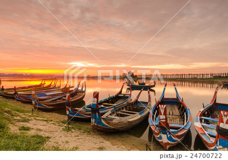 Wooden boat in Ubein Bridge at sunrise 24700722