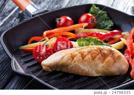 Tasty Grilled chicken fillet and bell pepper in a Tasty Grilled chicken fillet and bell pepper in a 24706335
