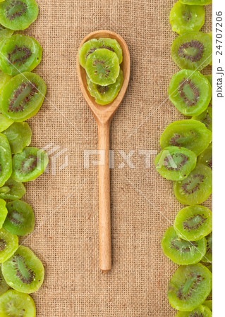 Wooden spoon with kiwi 24707206