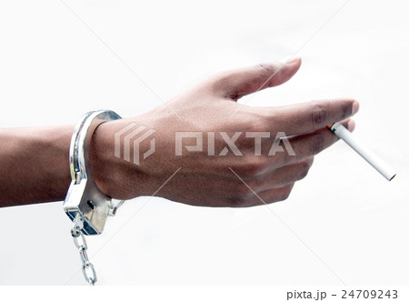 hand with shackle show addict cigarette 24709243