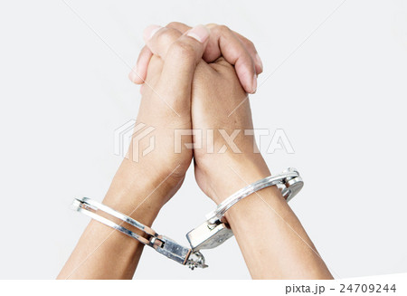 hand with shackle on white hand with shackle on white 24709244