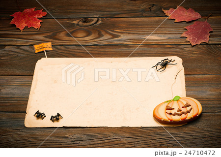 Halloween invitation over wooden background 24710472