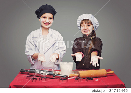Children making christmas gingerbread Children making christmas gingerbread 24715446