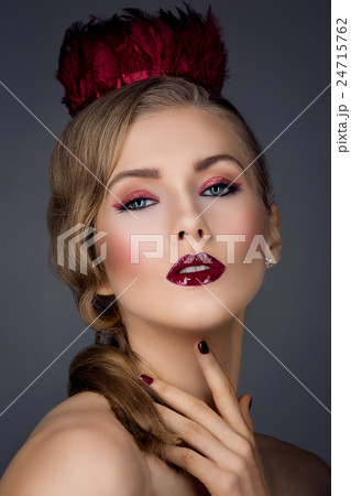 Beautiful girl with red makeup 24715762