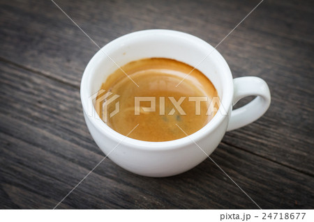Espresso double shot on wood background  24718677