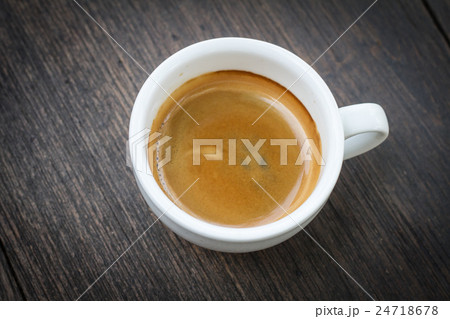 Espresso double shot on wood background 24718678