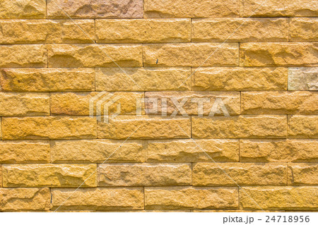 brick wall made of light brown facing bricks 24718956