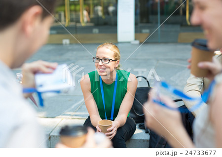 Cheerful colleagues meeting for coffee break. Cheerful colleagues meeting for coffee break. 24733677