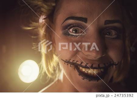 Horrible girl with scary mouth and eyes 24735392