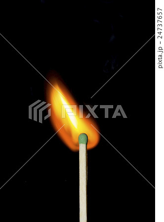Ignition of a match, with smoke on dark background Ignition of a match, with smoke on dark background 24737657