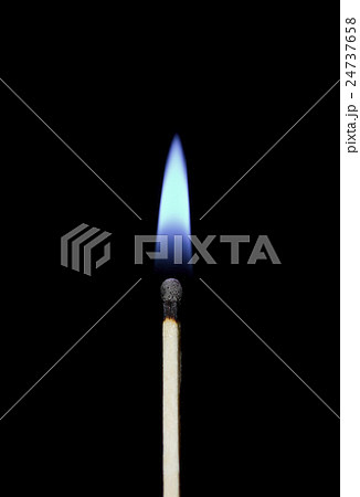 Burning match close-up on a black background. Burning match close-up on a black background. 24737658