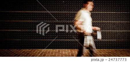 Winemaker in cellar holding in these hands red 24737773