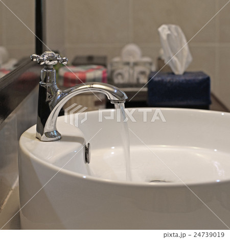 ceramic washbasin and metal faucet ceramic washbasin and metal faucet 24739019